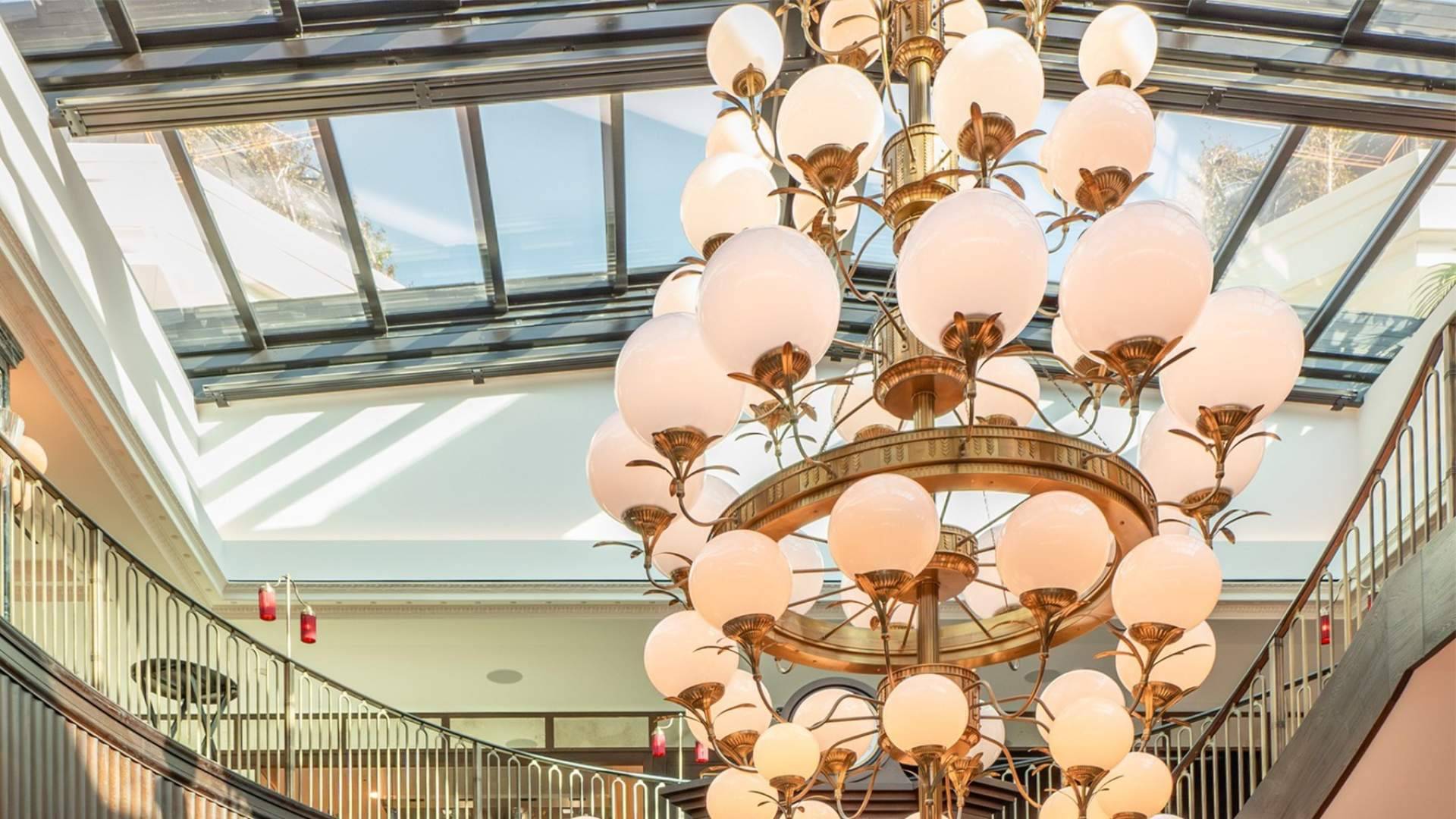 How the Airclos T7003RPT system redefines the architectural envelope through glass retractable roofs